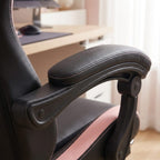 Zoom sur l'accoudoir incurvé et rembourré en simili cuir noir avec surpiqûres roses élégantes.