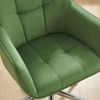 Zoom sur l'assise moelleuse en velours vert de la chaise de bureau réglable en hauteur.