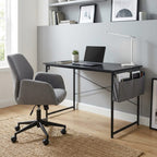 Ambiance bureau à domicile avec le modèle compact noir, soulignant le design épuré et la sacoche de rangement latérale.