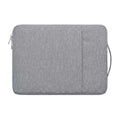 Housse pour ordinateur Denim Nomad gris clair, vue de face orthogonale à plat sur fond blanc.