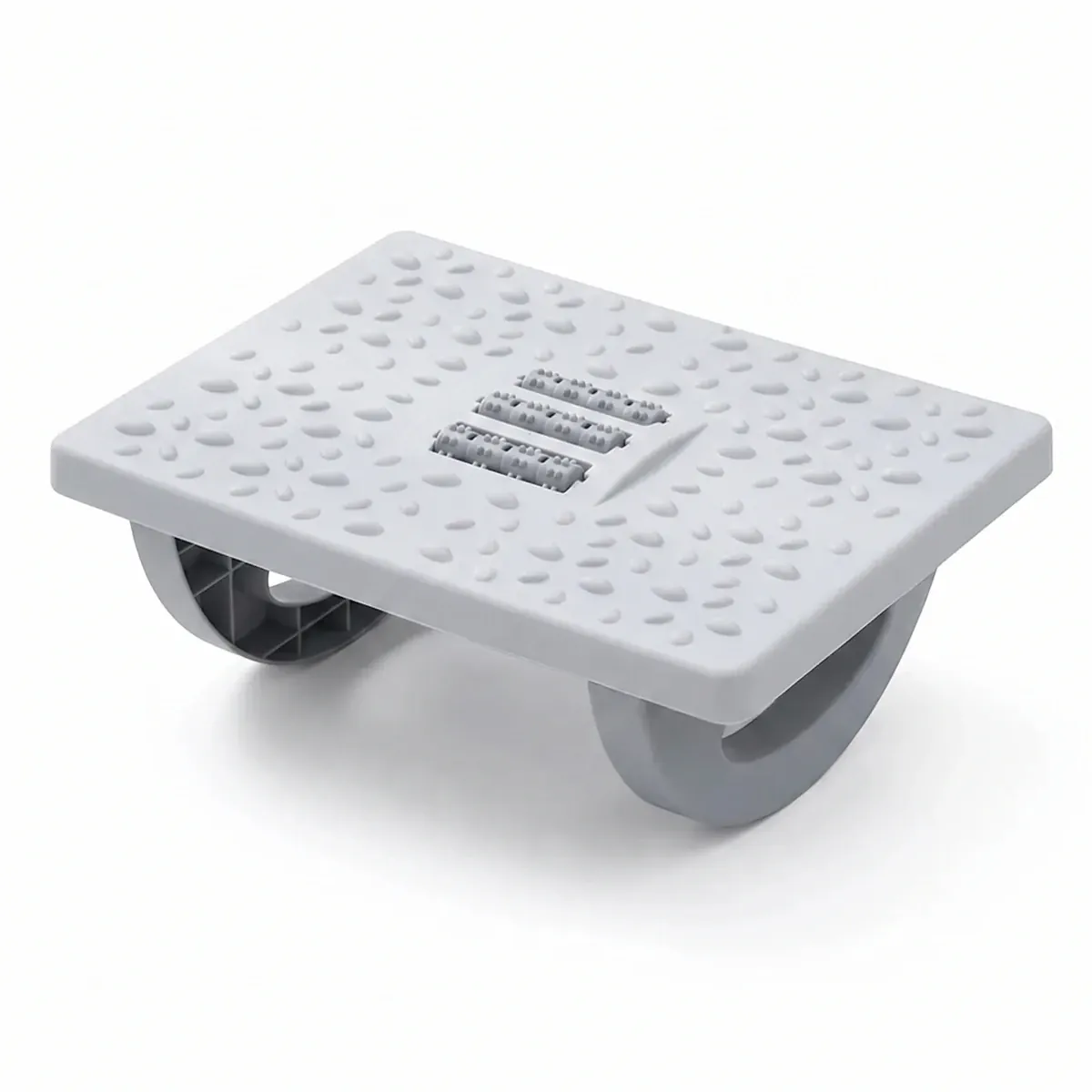 Repose-pieds ergonomique Kinetik Core | Polymère HD - Bascule Active - Posture & Circulation | Version grise, vue isolée sur fond blanc, montrant la surface à picots de massage et les rollers centraux.