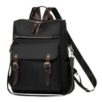 Sac à dos femme pour ordinateur Sienna noir imperméable présenté de face avec ses boucles dorées.