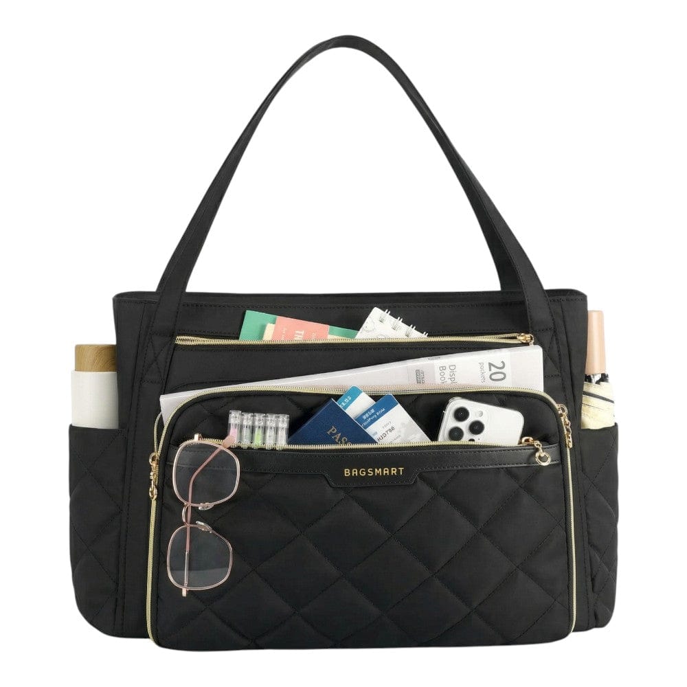 Sac ordinateur femme L'Ingénieuse noir matelassé avec rangements extérieurs pour téléphone et passeport.