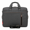 Sac ordinateur pour homme ErgoShield gris anthracite affichant le compartimentage et les finitions de protection antichoc.