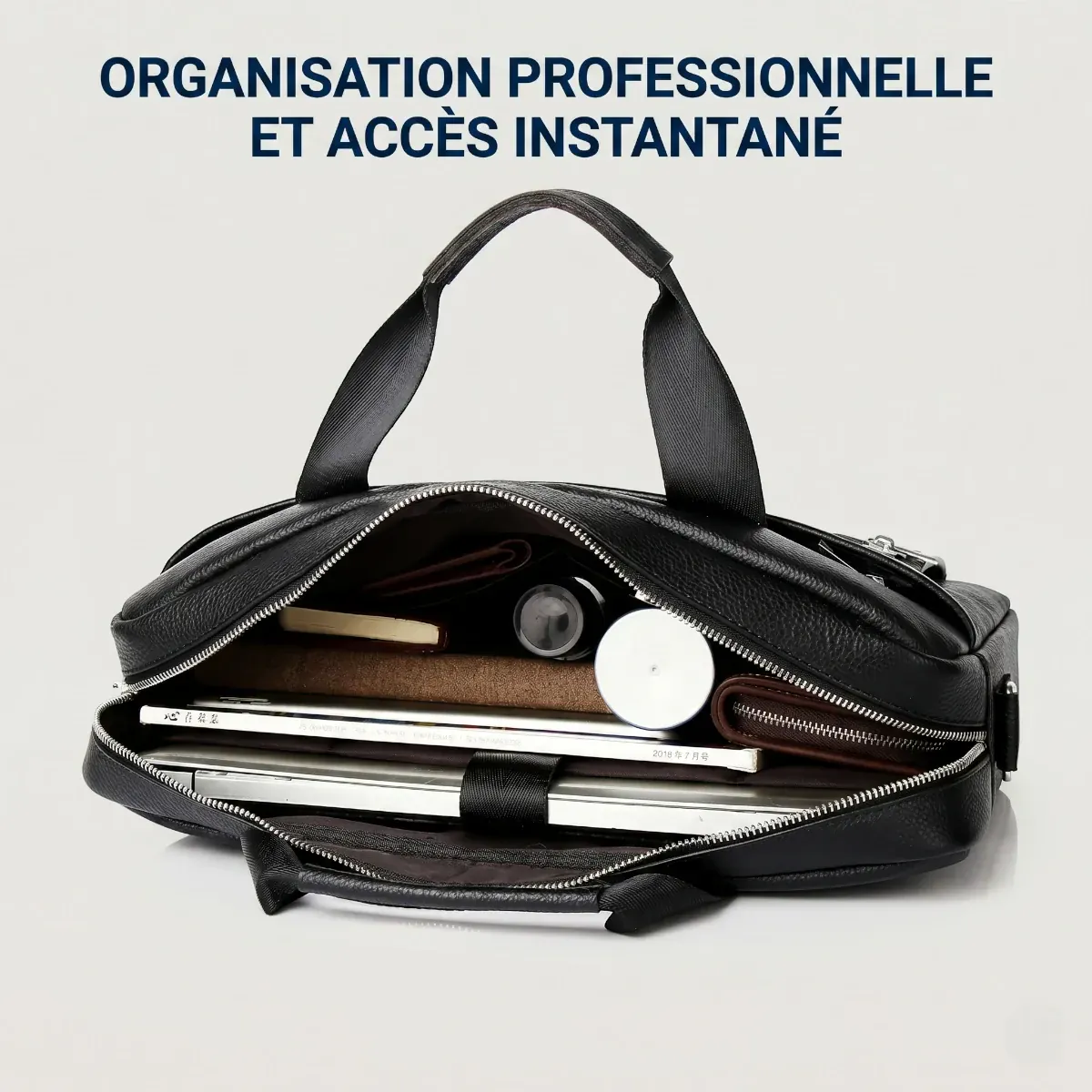 Compartimentage intérieur optimisé de la sacoche ordinateur homme L'Intemporel montrant le PC portable et les dossiers A4.