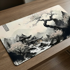Vue d'angle rapprochée de la texture micro-tissée de qualité premium du tapis de souris Lunar Shogun XXL, montrant le design détaillé de temple et cerisier en fleurs.