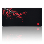 Tapis de souris Sakura Midnight XXL noir et rouge vif, esthétique immersive et précision chirurgicale pour le jeu.