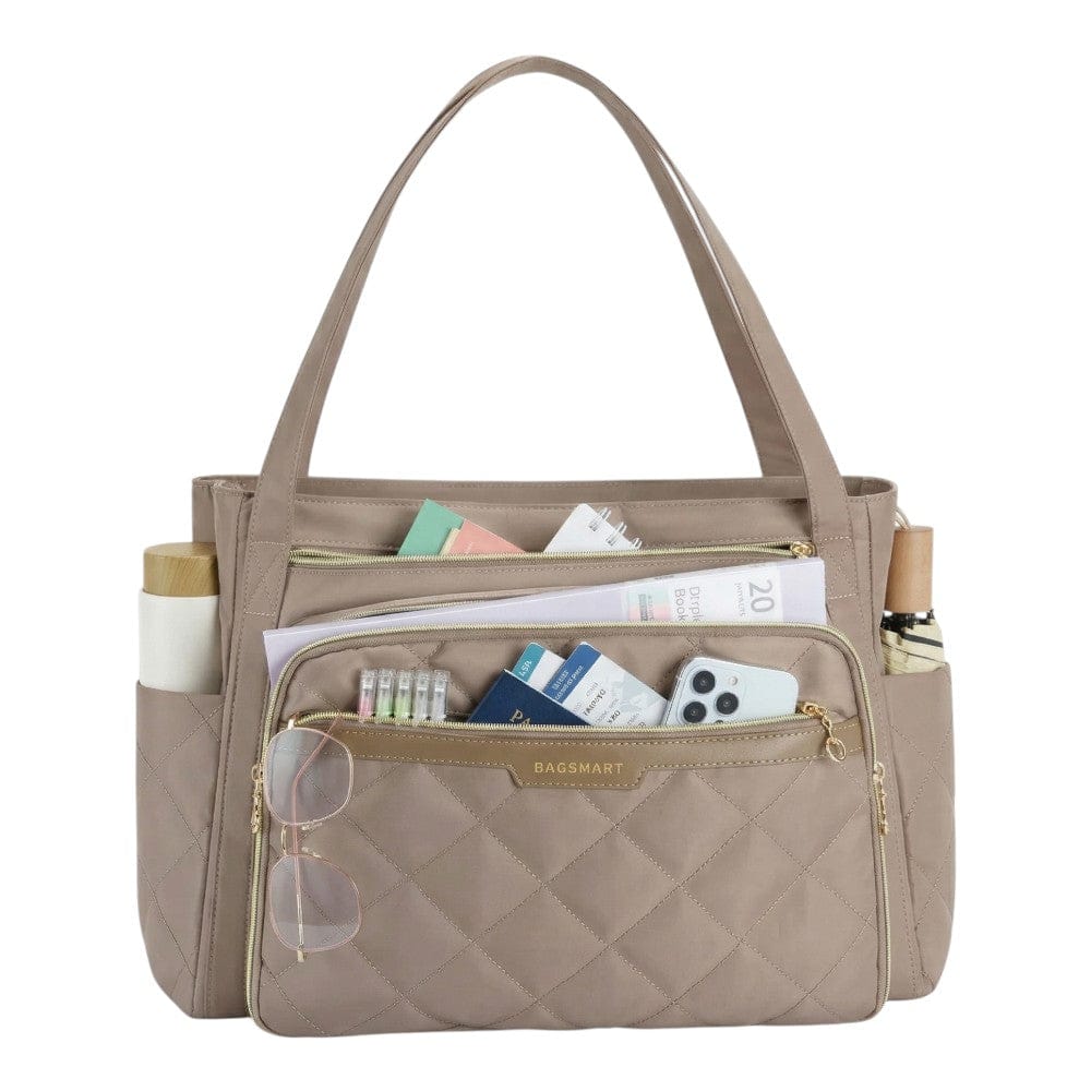 Tote bag ordinateur chic L'Ingénieuse coloris beige taupe avec compartiments organisés et finitions dorées.
