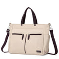 Tote bag ordinateur femme L'Aérienne 15" nylon chic ultra léger, vue de face extérieure, beige avec poignées et bandoulière marron, sur fond blanc. 