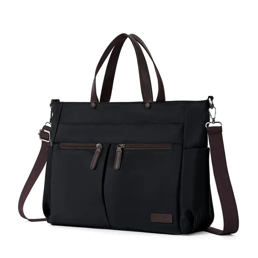 Tote bag ordinateur femme L'Aérienne 15" nylon chic ultra léger, vue de face extérieure, noir avec poignées et bandoulière marron, sur fond blanc.